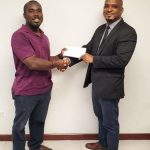 Mr. Nicholas Kirton (Left, BWA Engineer) and Dr. Kirk Douglas (Director, CBS). Winner of the WSRN-S biosecurity training video competition among BWA staff presented with a $100 supermarket voucher.